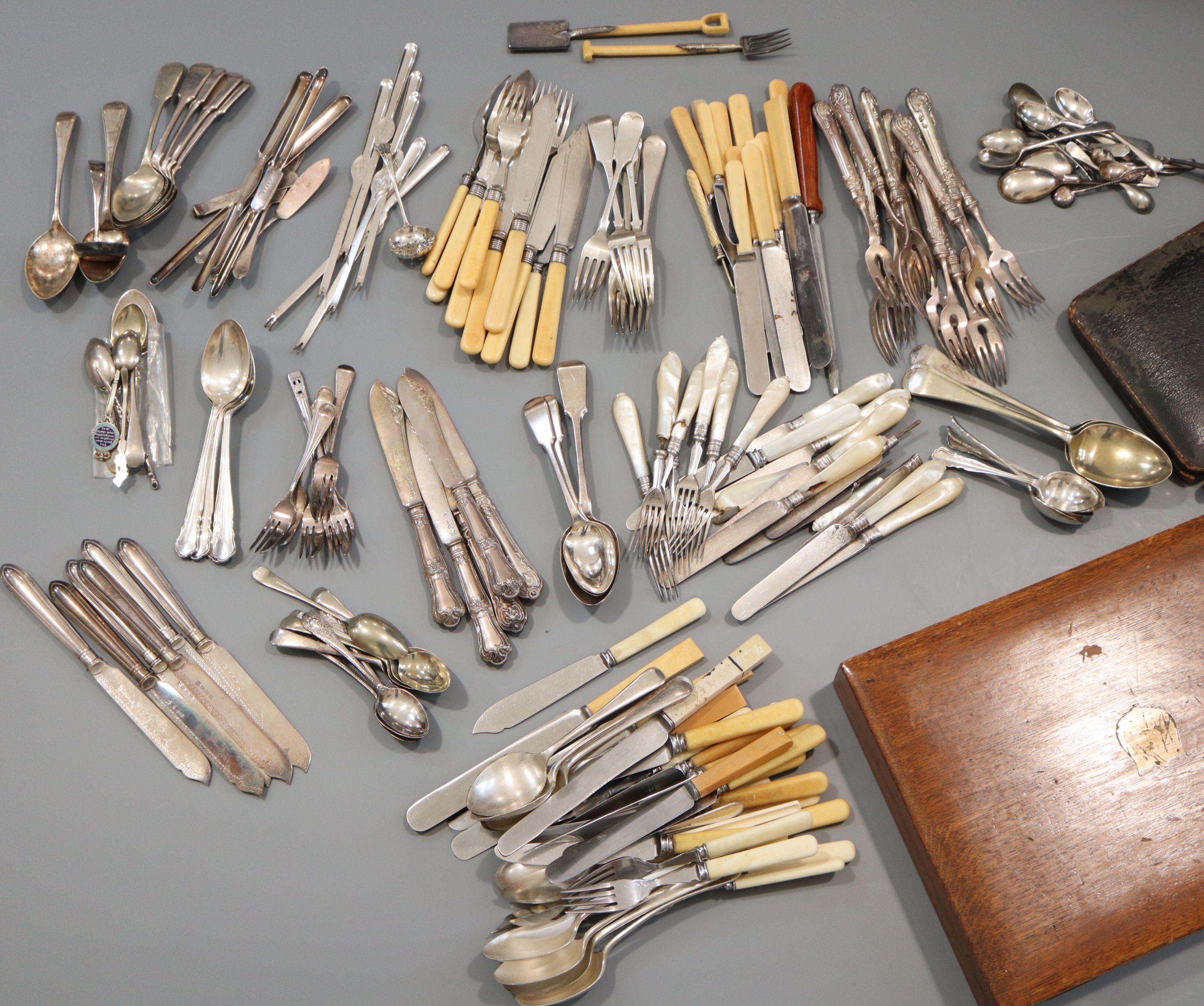 An oak cased set of twelve pairs of Elkington & Co silver plated fish knives and forks,